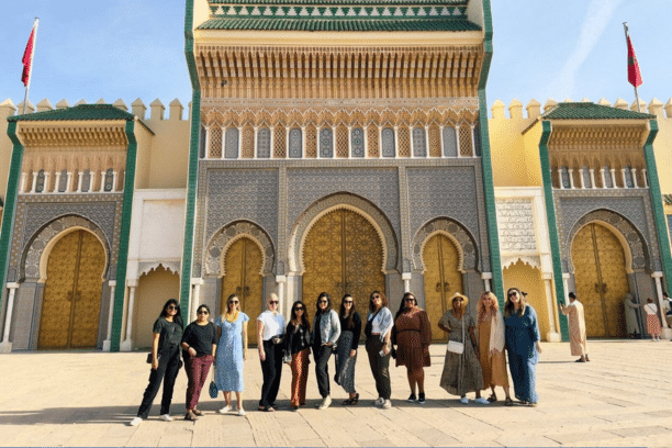 Travelers visiting the Royal Palace of Fez (Dar al-Makhzen), one of Morocco's most iconic historical landmarks.