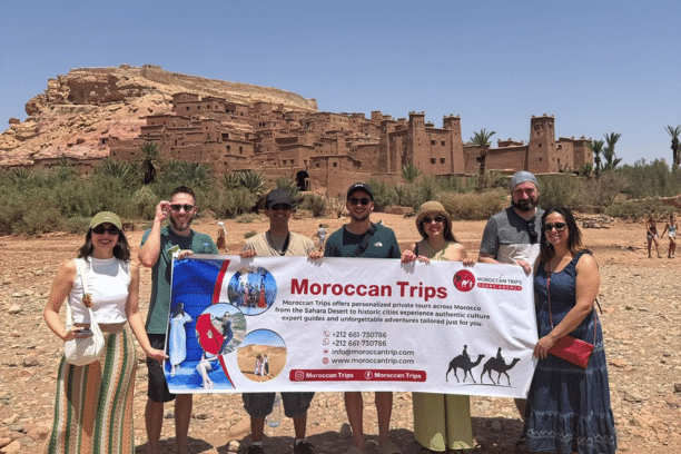 Travelers visiting Ait Ben Haddou Kasbah in Morocco